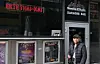 Nim Jirawat, også kjent som DJ Nim driver karaokebaren Smileclub.