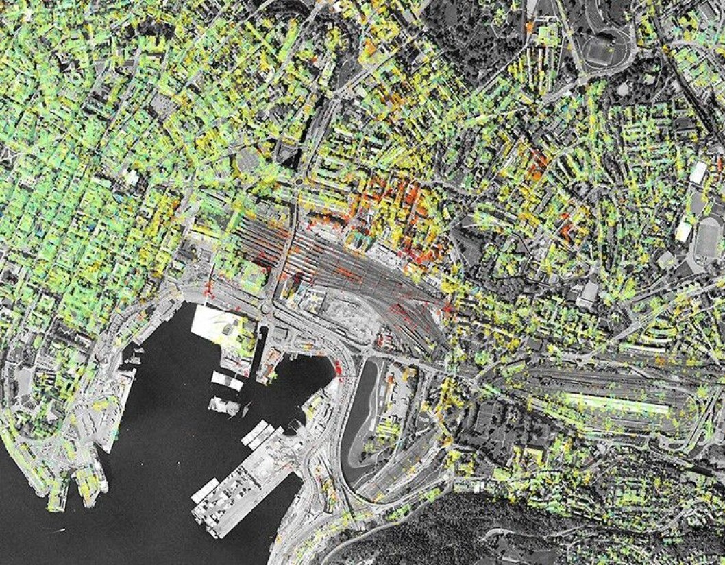 Satelittbilder som dette blir gratis tilgjengelig på NGUs nettsider fra torsdag. De røde punktene viser hvor deler av Bjørvika synker med opp til 3 centimeter årlig. Foto: NGU Satelittbilder som dette blir gratis tilgjengelig på NGUs nettsider fra torsdag. De røde punktene viser hvor deler av Bjørvika synker med opp til 3 centimeter årlig. Foto: NGU