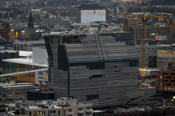 Bygging av Lambda museet - det nye Munch- museet bak Operaen i Bjørvika i Oslo sett fra Ekeberg restauranten i novemberkulda. Foto: Heiko Junge / NTB scanpix Bygging av Lambda museet - det nye Munch- museet bak Operaen i Bjørvika i Oslo sett fra Ekeberg restauranten i novemberkulda. Foto: Heiko Junge / NTB scanpix