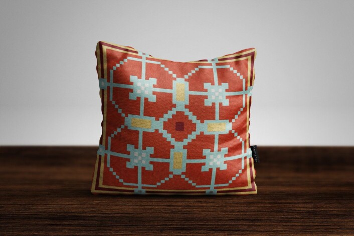 Puta Breime fra Kristiania Design, inspirert av Gustav Vigeland i hytterød med klassisk geometrisk mønster. Foto: Kristiania Design Puta Breime fra Kristiania Design, inspirert av Gustav Vigeland i hytterød med klassisk geometrisk mønster. Foto: Kristiania Design