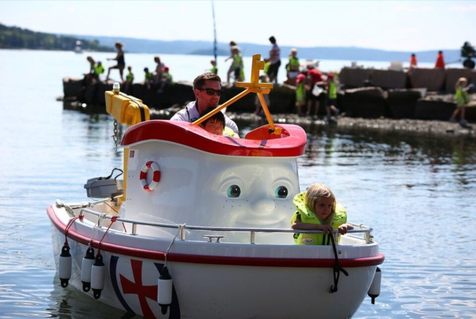Barna får muligheten til å bli med en tur på Eliasbåten på Havnelangs i år. Foto: Redningsselskapet