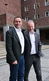 Arild Hermstad og Raymond Johansen utenfor Rådhuset.