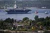 Oslo 20230524. Det amerikanske hangarskipet USS Gerald R. Ford i Oslofjorden, her sett fra Ekebergskrenten onsdag morgen. Skipet er verdens største krigsskip og skal ligge i havn i Oslo i fire dager.