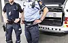 OSLO 20160620.Politiet i arbeid. Politi i garasje med politilogo på bil.Modellklarert til redaksjonell bruk.Foto: Gorm Kallestad / NTB
