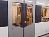 T-bane inne på stasjon perrong med passasjerer Foto: Arnsten Linstad